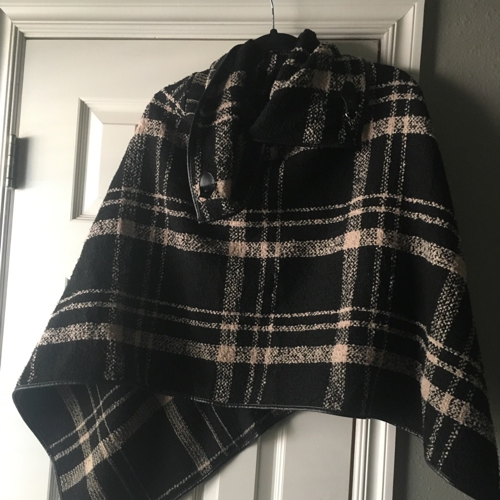 tan and black sweater poncho